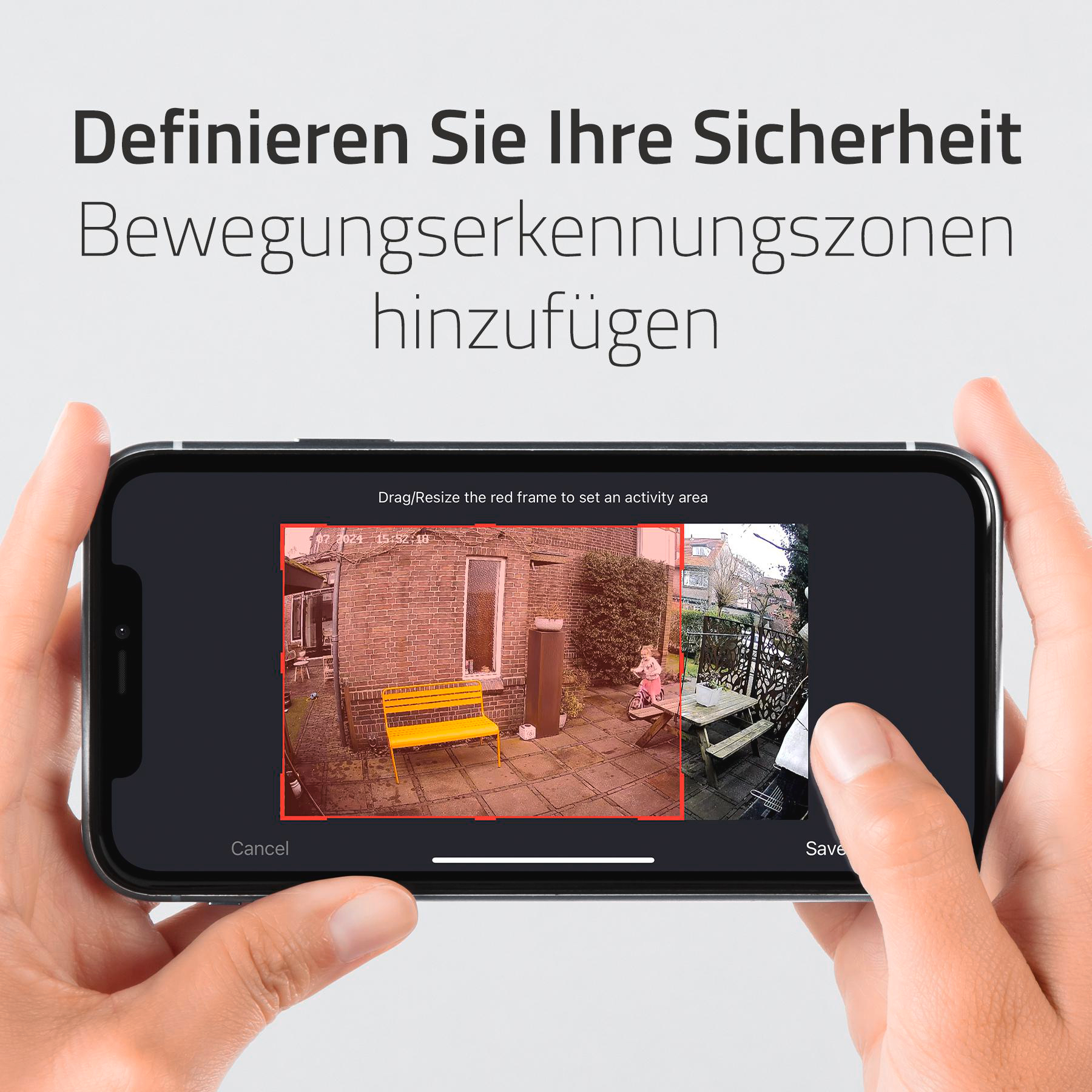 Smartphone-Bildschirm zeigt Ansicht, Hände halten das Telefon. Roter Rahmen.