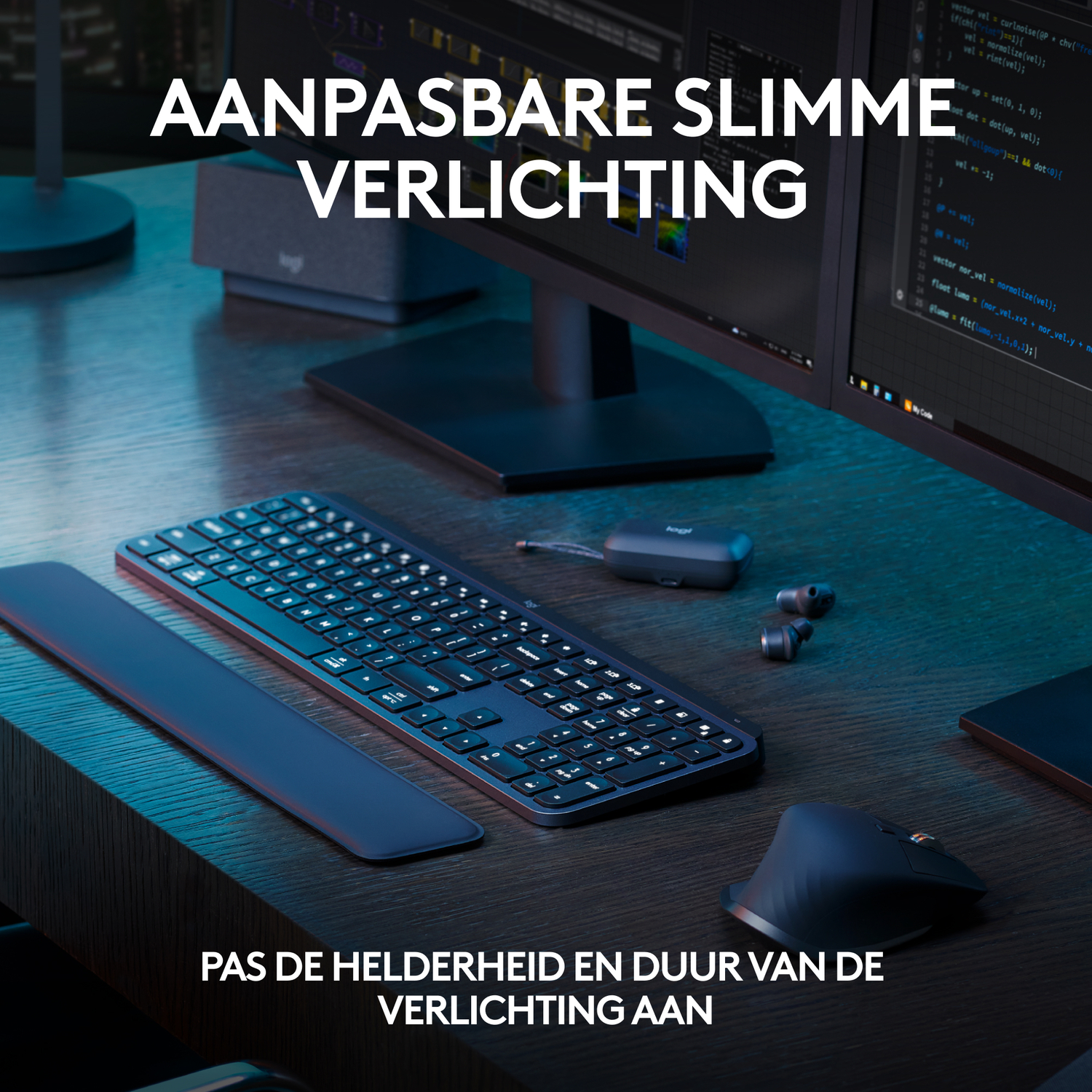 Dark keyboard with wrist rest, mouse, and monitor setup. Adjustable smart lighting on the desk.
