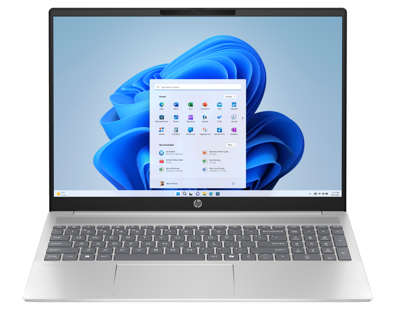 Otwarty laptop, ekran Windows 11. Srebrna klawiatura. Czarna ramka. Wyświetlanie ekranu głównego.