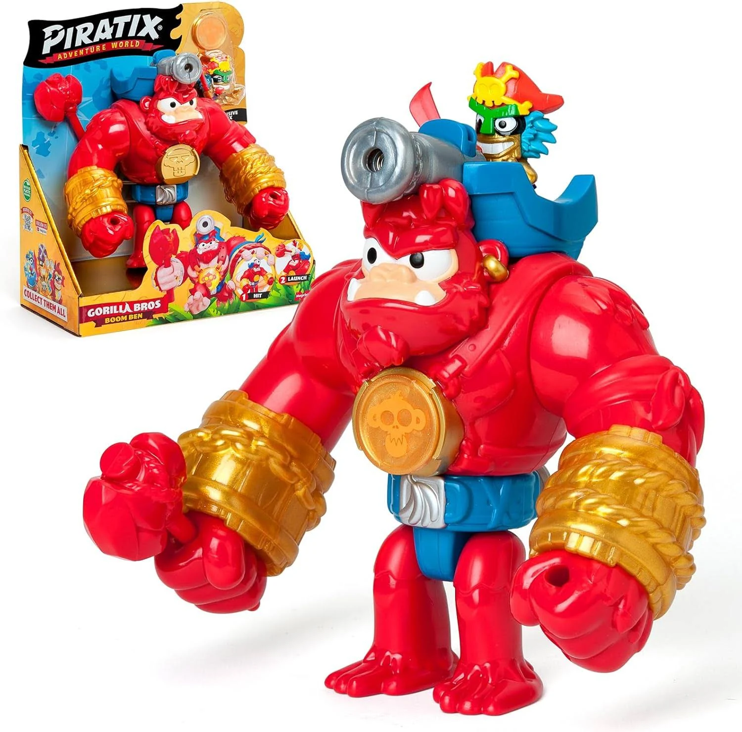 Un juguete de gorila rojo con detalles dorados y una figura de sombrero de pirata.