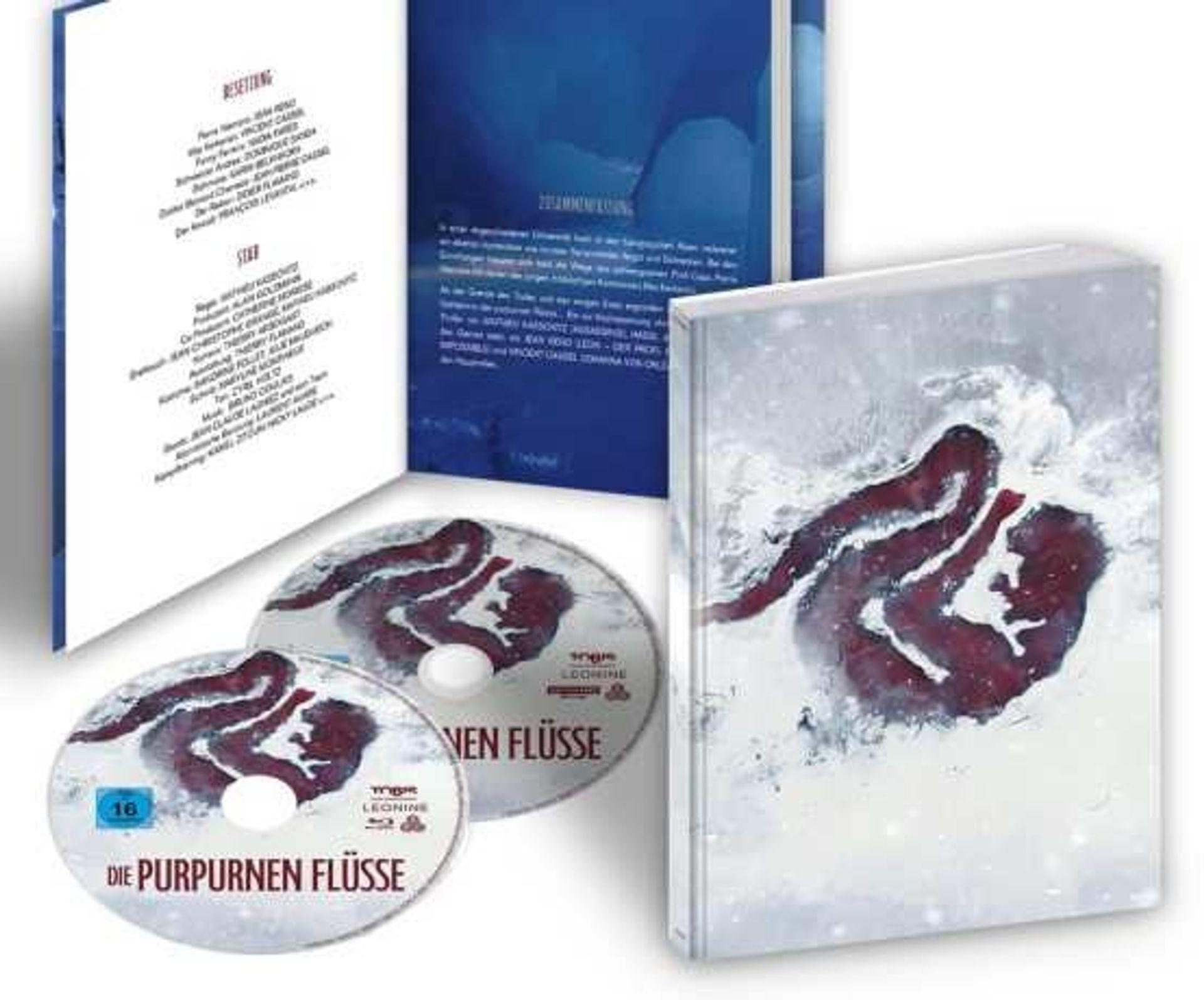Ein Buch mit lila Einband und 2 CDs.
