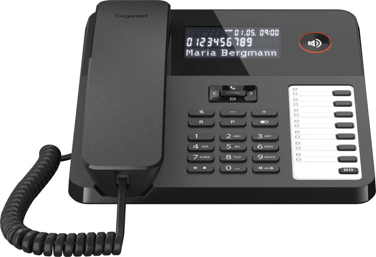 Ein schwarzes Bürotelefon mit einem Bildschirm, der Text und Tasten anzeigt.