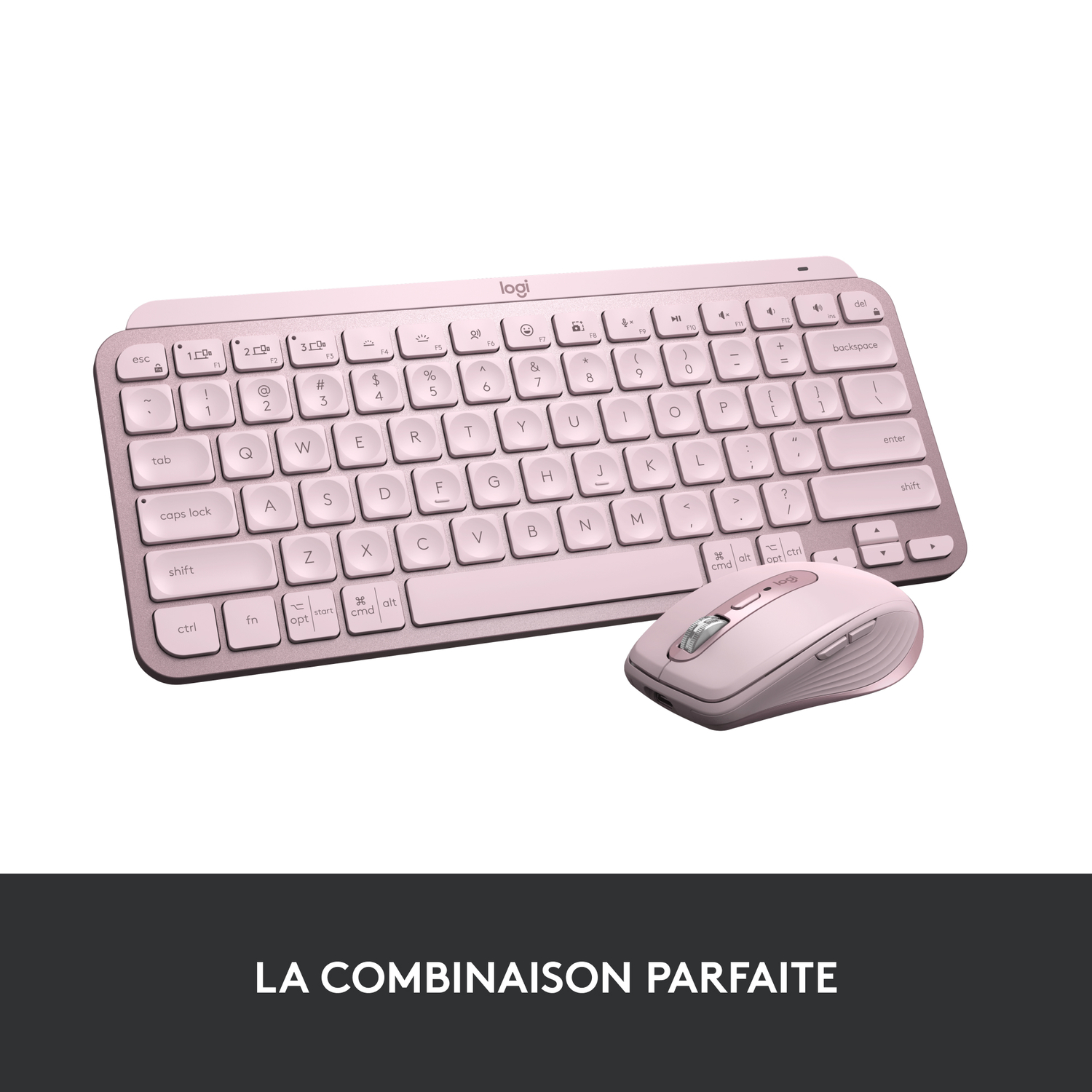 Ensemble clavier et souris roses. Les deux sont sur une surface blanche. Clavier et souris visibles.