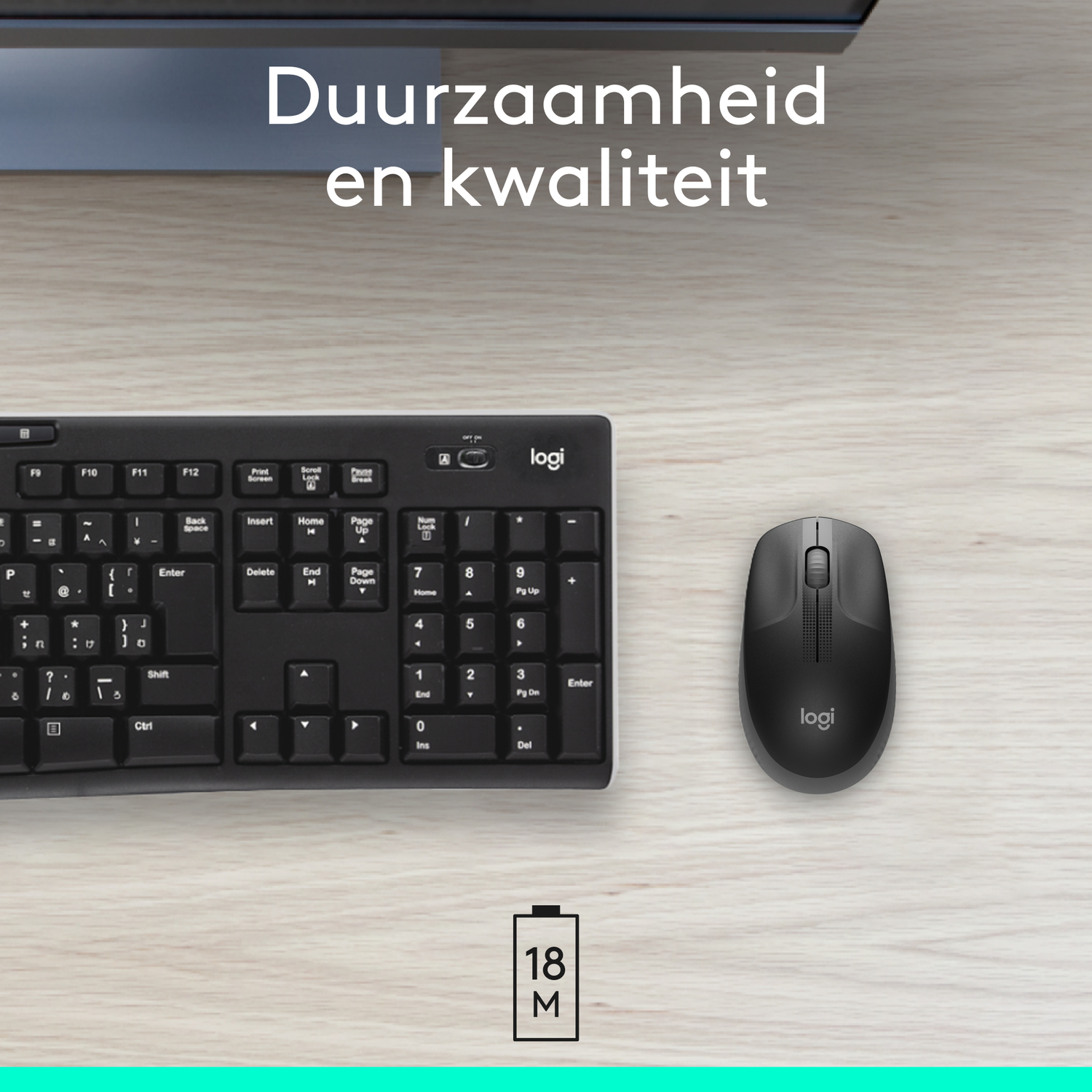 A black keyboard and mouse are on a light wood surface with text above.