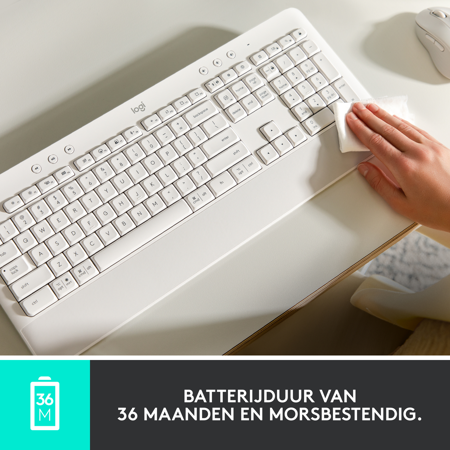 White keyboard being cleaned. Text: 36-month battery life and spill resistant.