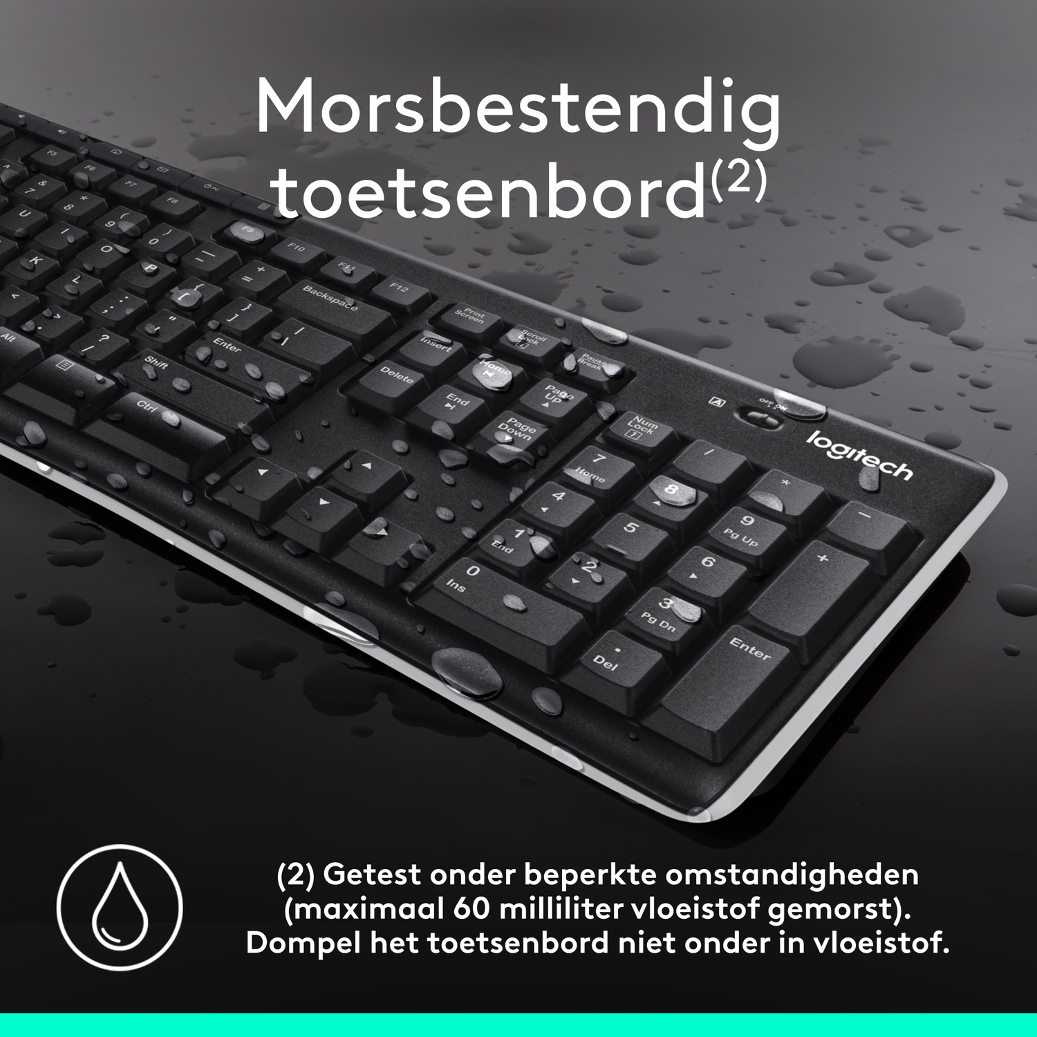 Black keyboard with water droplets on it. Splash-resistant design, on a black surface.
