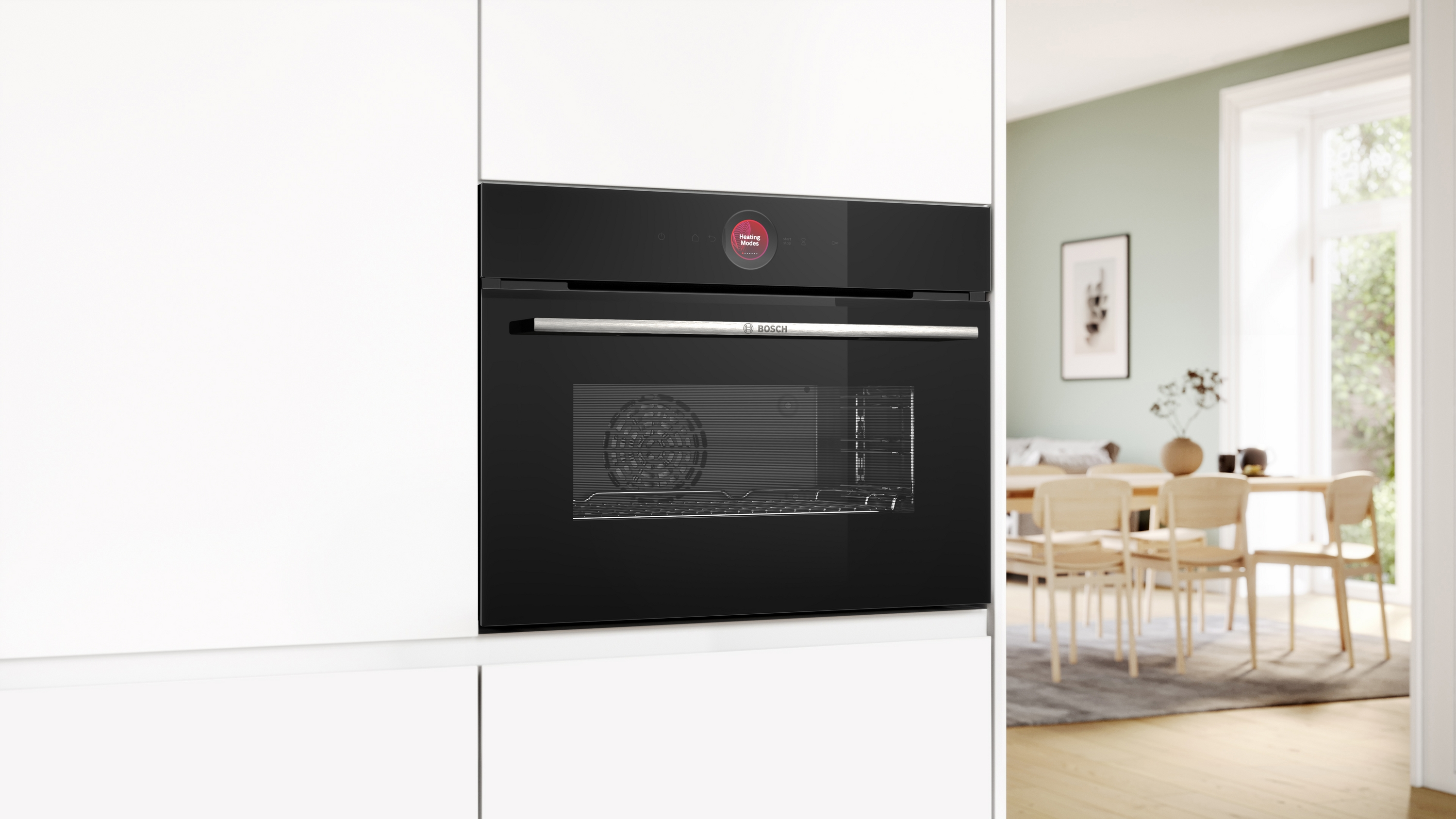 Einbau-Backofen in Schwarz mit rotem Display, in weißer Küche.