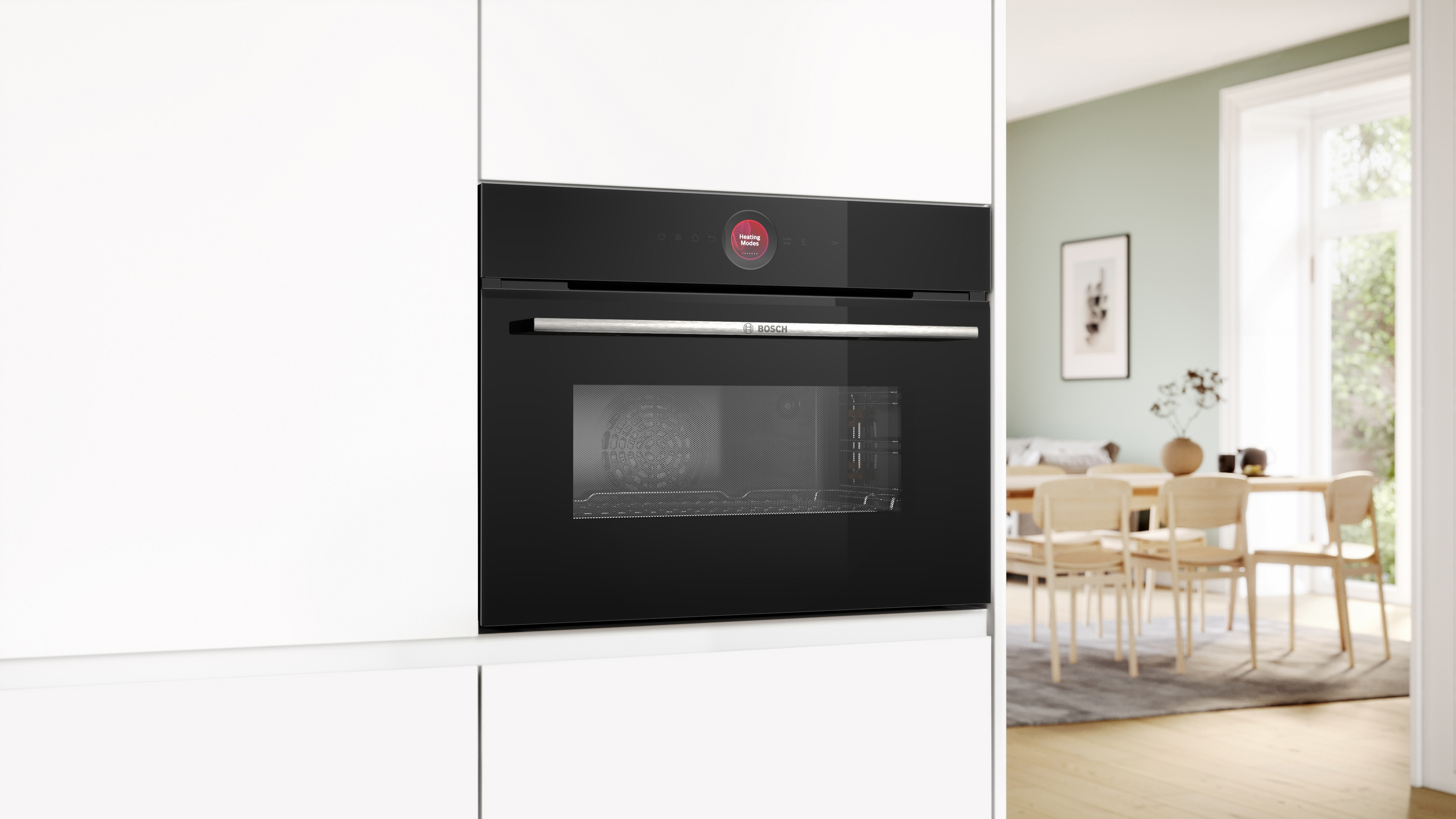 Einbau-Backofen in Schwarz mit rotem Display, in weißer Küche.