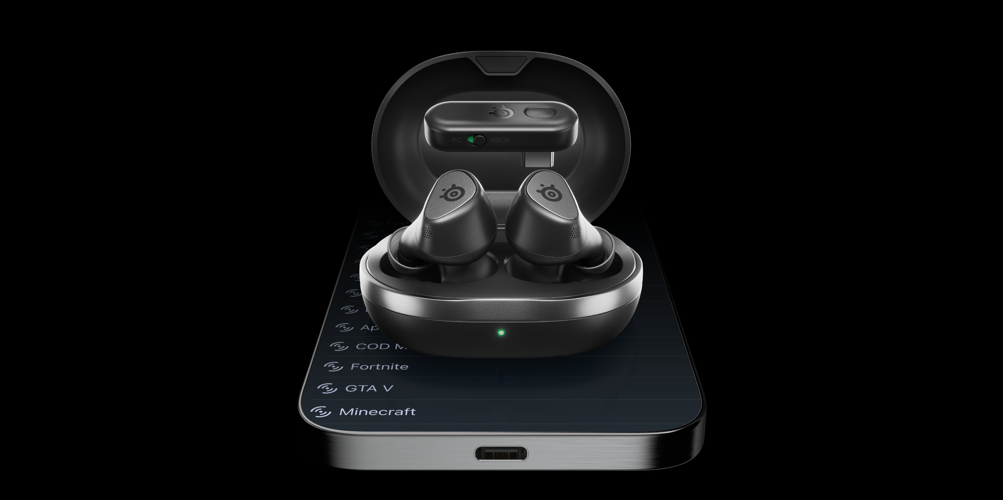 Bezprzewodowe słuchawki w etui, wraz ze stacją ładującą i telefonem.