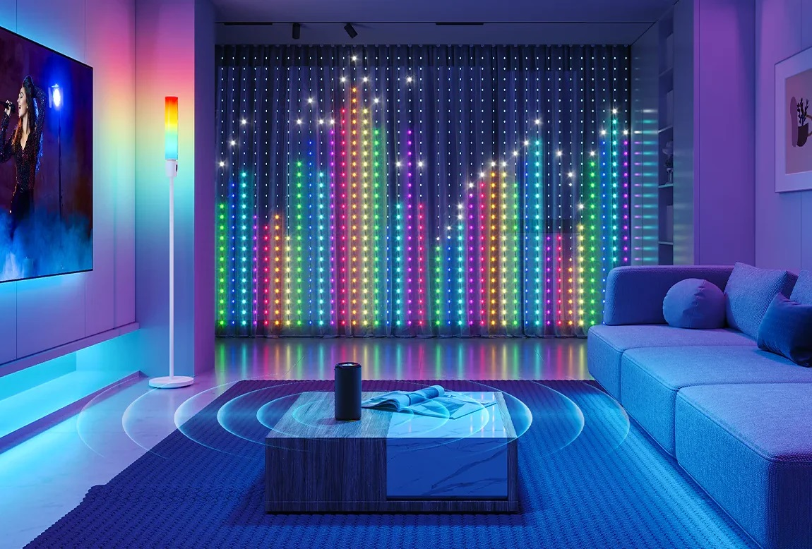 Salon z dużym telewizorem, kolorowymi światłami LED i nowoczesnym stolikiem kawowym.