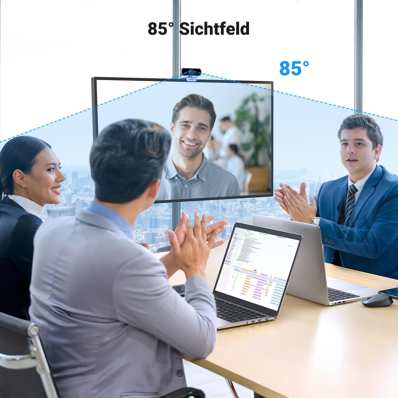 Personen in einem Meeting, die einen Bildschirm mit einer Webcam betrachten. Die Webcam hat ein 85°-Sichtfeld.