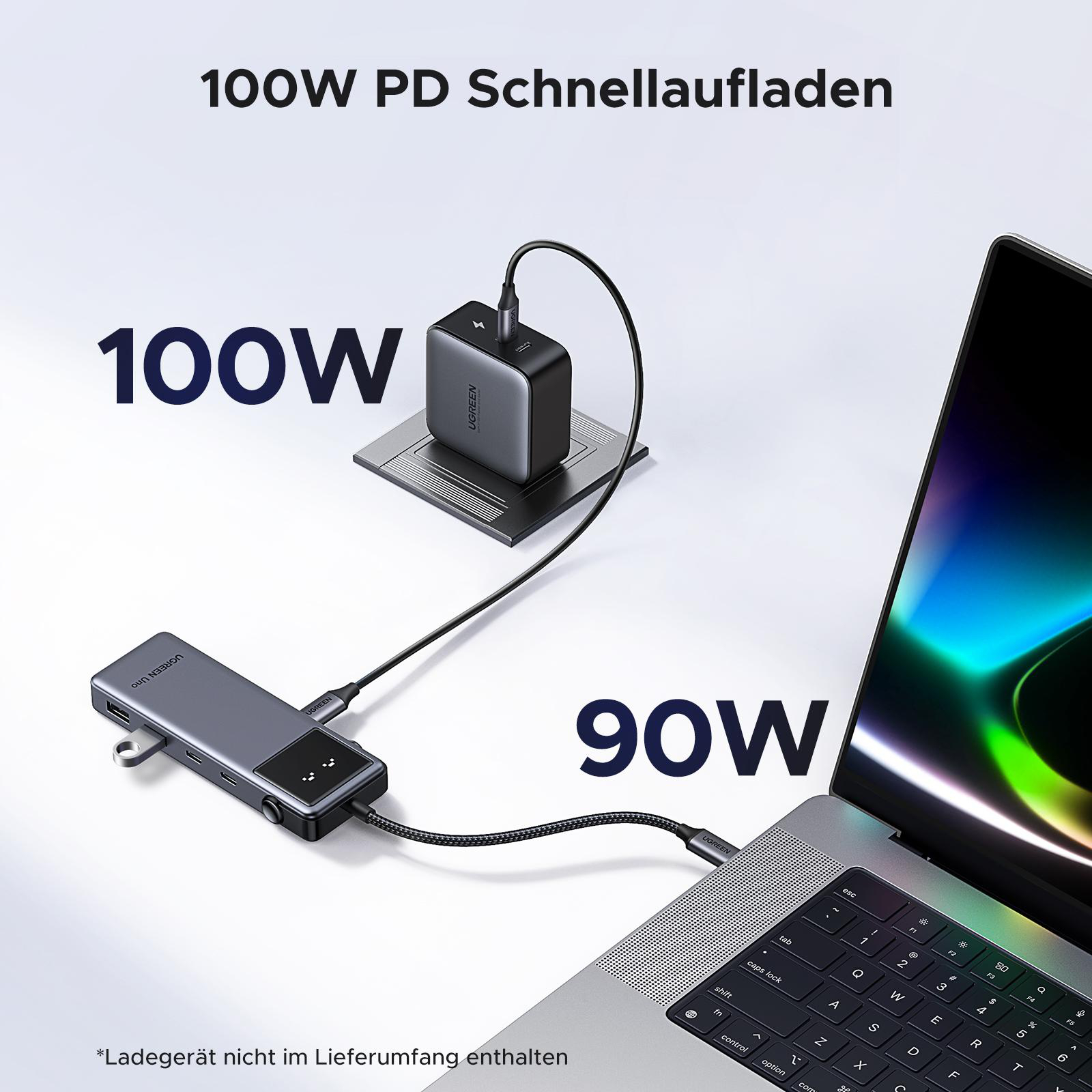 Laptop, der an ein Ladegerät und einen Hub angeschlossen ist.