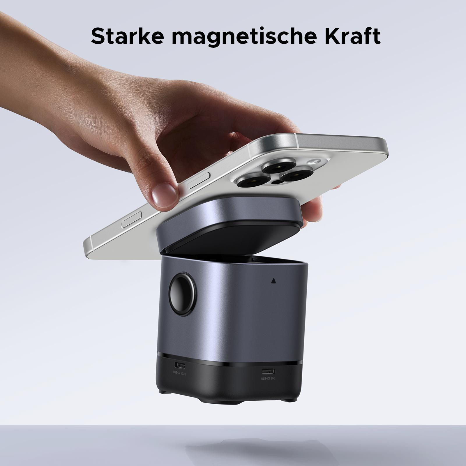 Telefon magnetisch an einem Gerät befestigt.