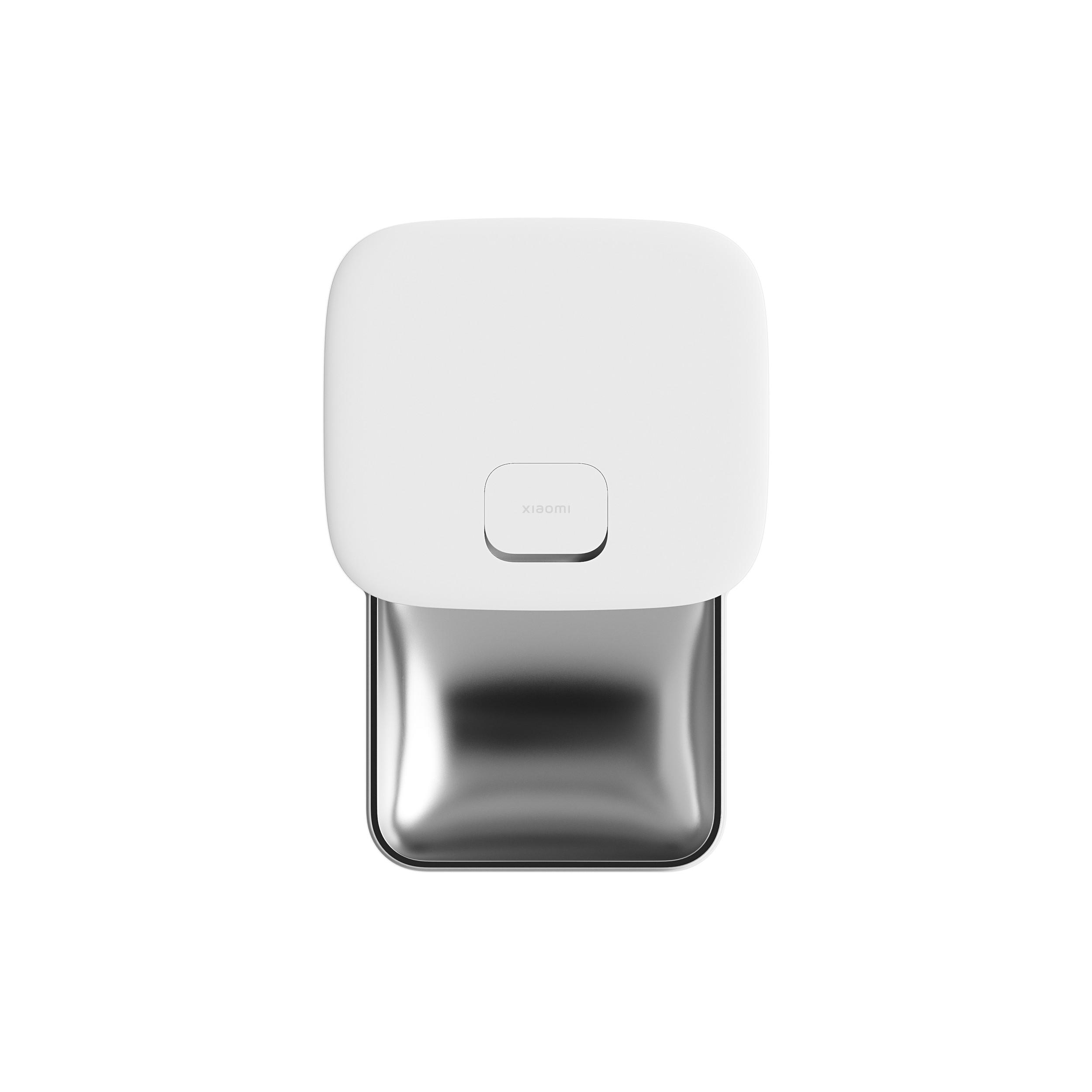 Ein weißes und silbernes Xiaomi-Gerät mit quadratischer Oberseite und rundem Boden.