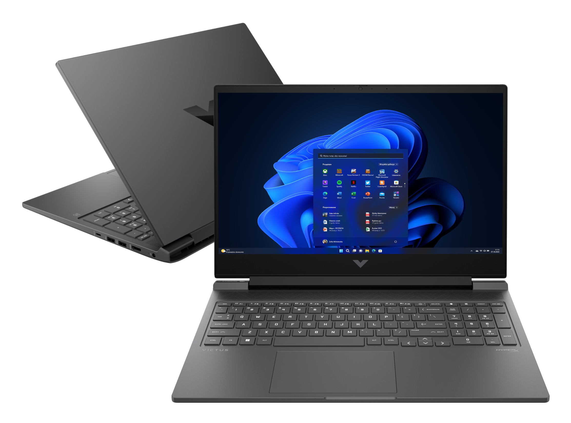 Dwa laptopy, jeden otwarty, pokazujący interfejs Windows 11. Drugi jest zamknięty i przechylony.