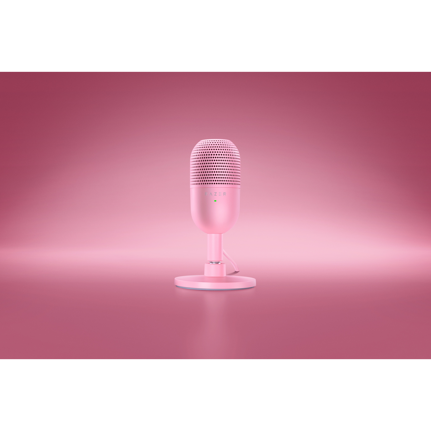 Pink microphone on a pink stand. It's a Razer microphone. The background is gradient pink.