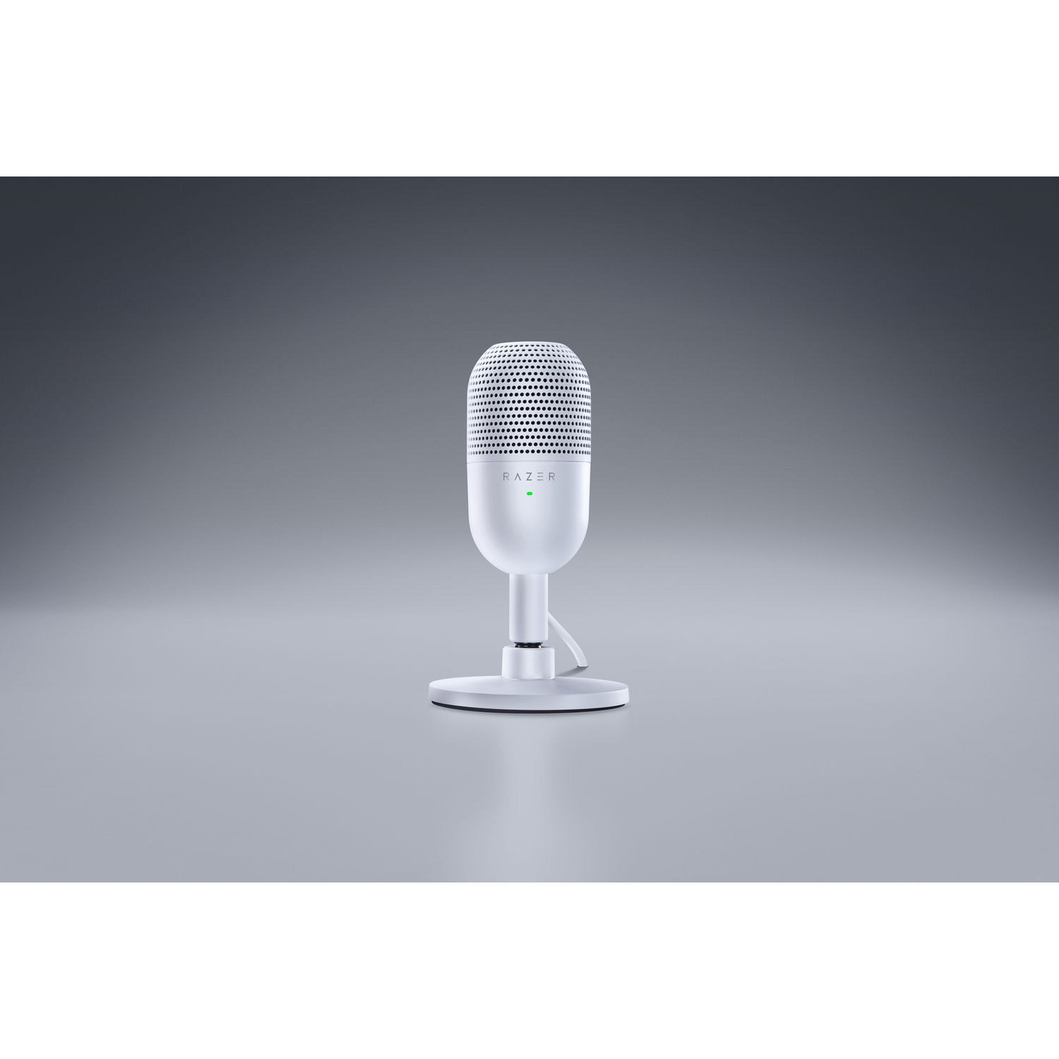 White Razer microphone on a stand, white base, on a grey surface.