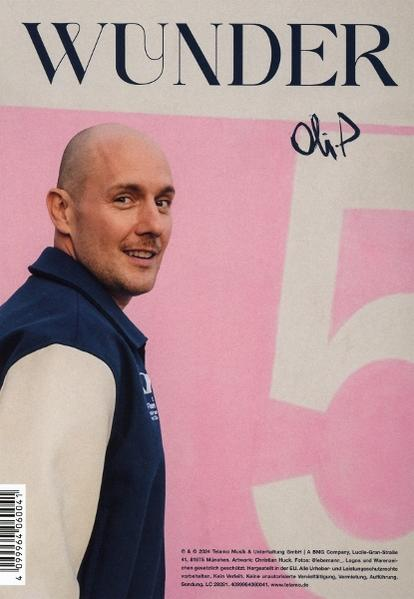 Ein Magazincover zeigt einen glatzköpfigen Mann in einer blauen Jacke mit weißen Ärmeln.