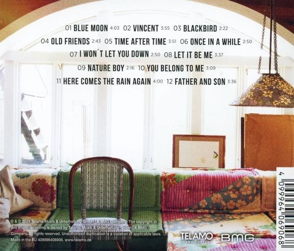 CD-Cover mit Text und einem Foto eines Zimmers mit Möbeln und einer Pendelleuchte.