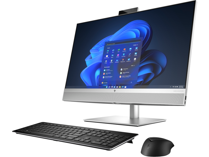 Silberner HP-Computer. Monitor zeigt Windows-Oberfläche. Tastatur und Maus.