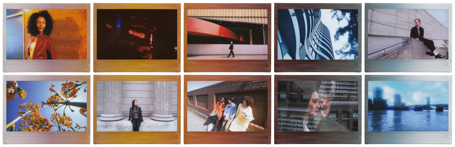 Ten framed photos on a wall, showcasing various urban and natural scenes and portraits.