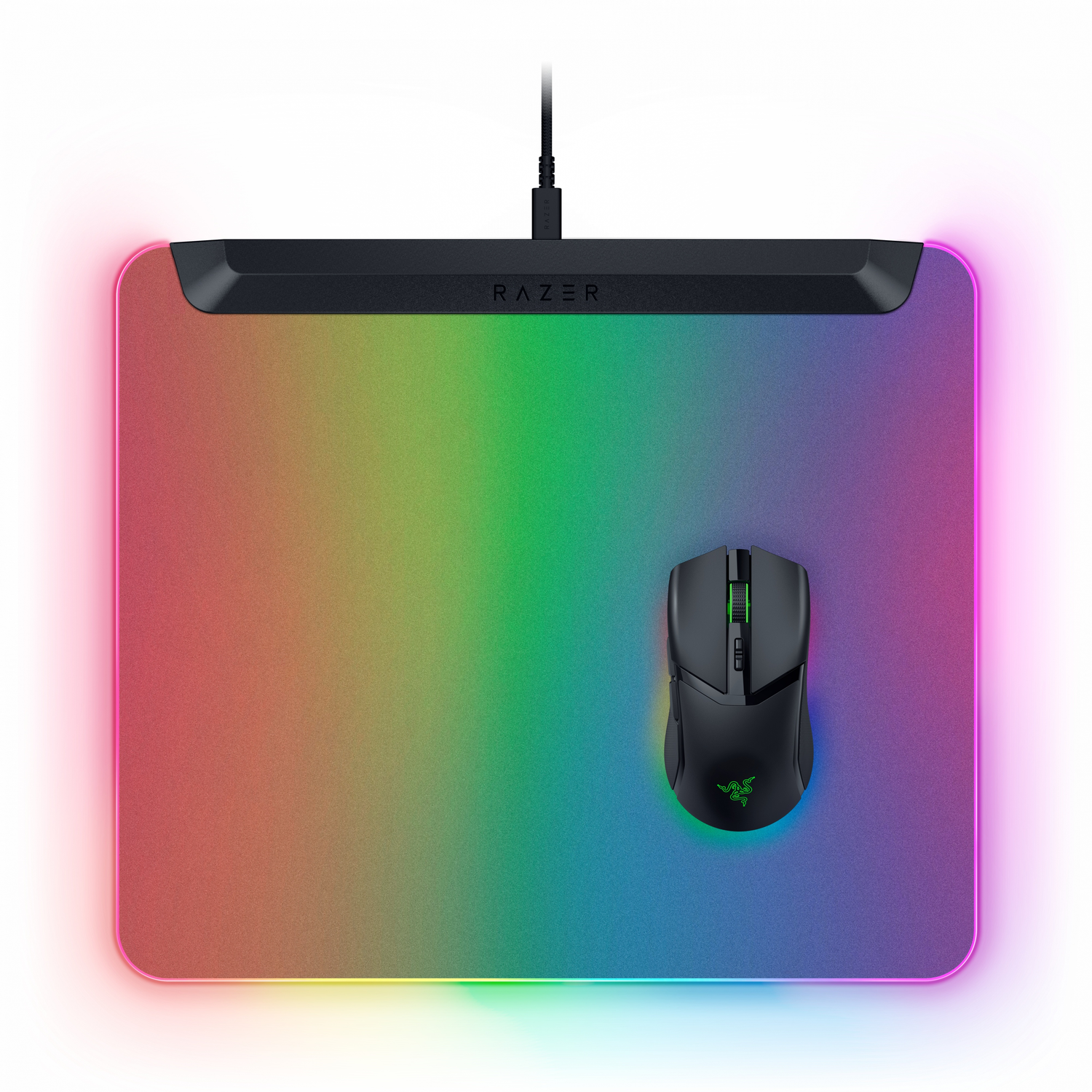 A rainbow-colored mousepad with a black mouse on top.