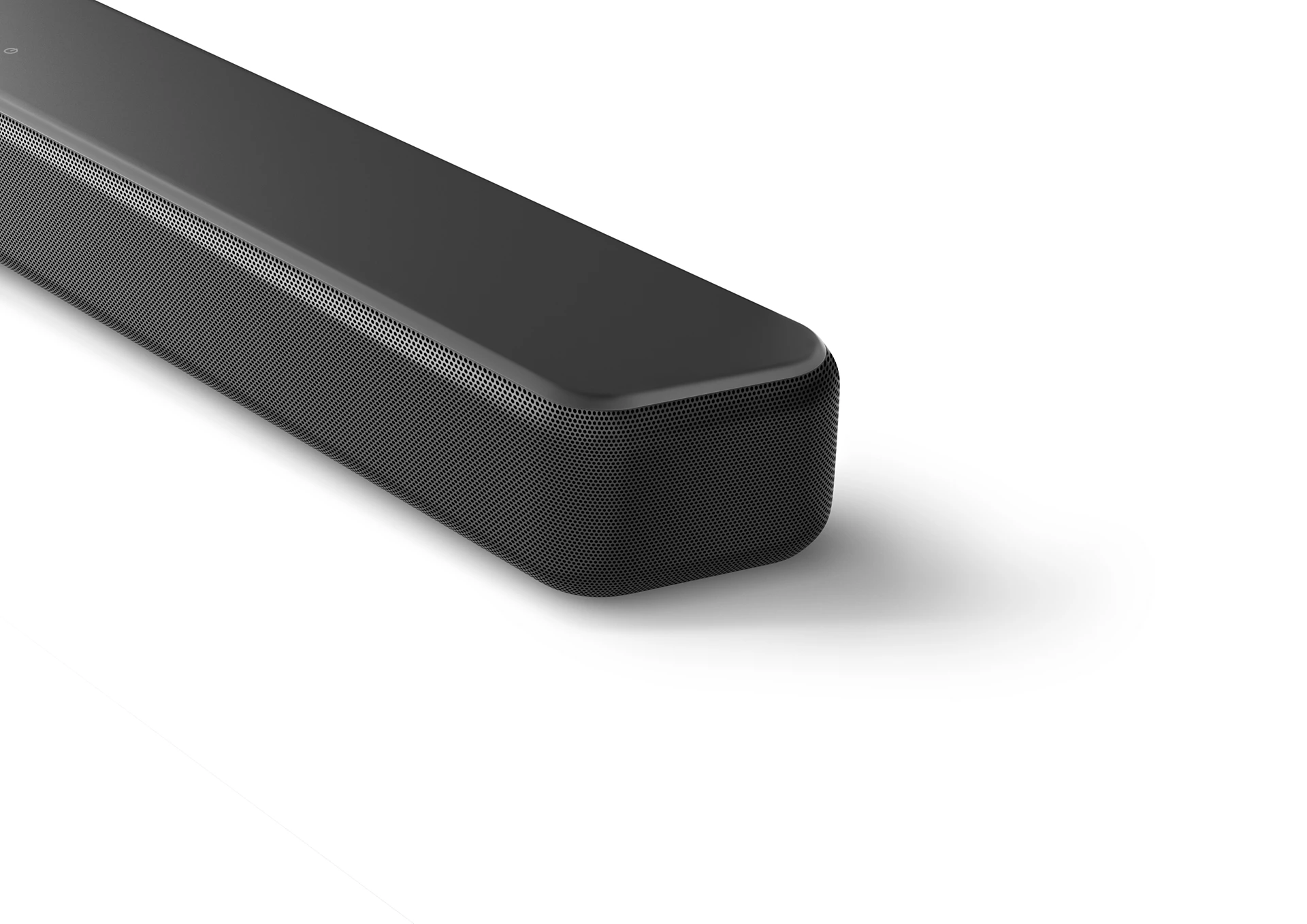 Una barra de sonido negra sobre fondo blanco, toma de cerca.