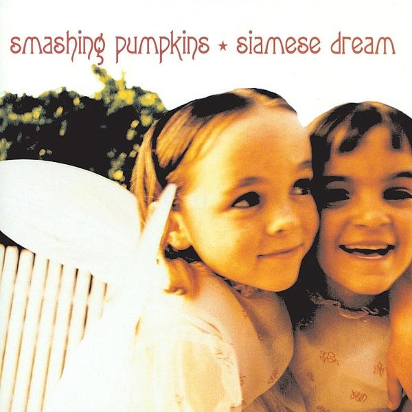 Album borító: két lány, egyik szárnyakkal, mosolyog. Cím: Smashing Pumpkins - Siamese Dream.