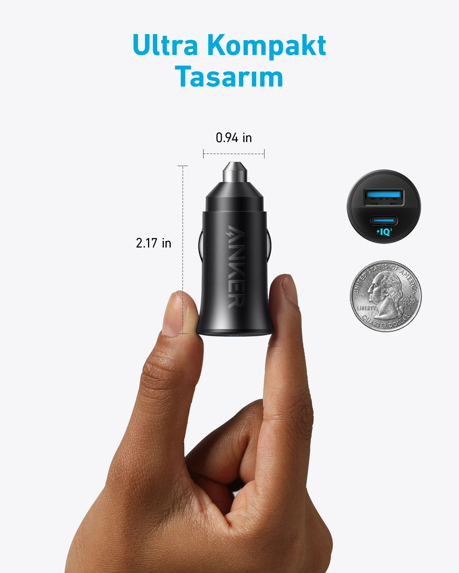 USB portlu ve metal üstü olan siyah bir araç şarj cihazı. Boyut karşılaştırması için yanına bir çeyrek dolar yerleştirilmiş.