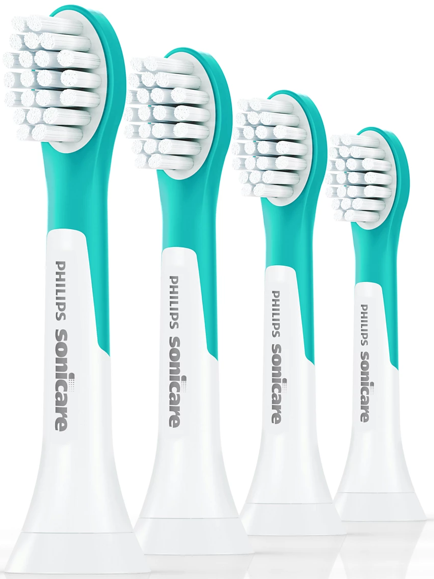 Quattro testine per spazzolino Philips Sonicare, bianche e verde acqua.