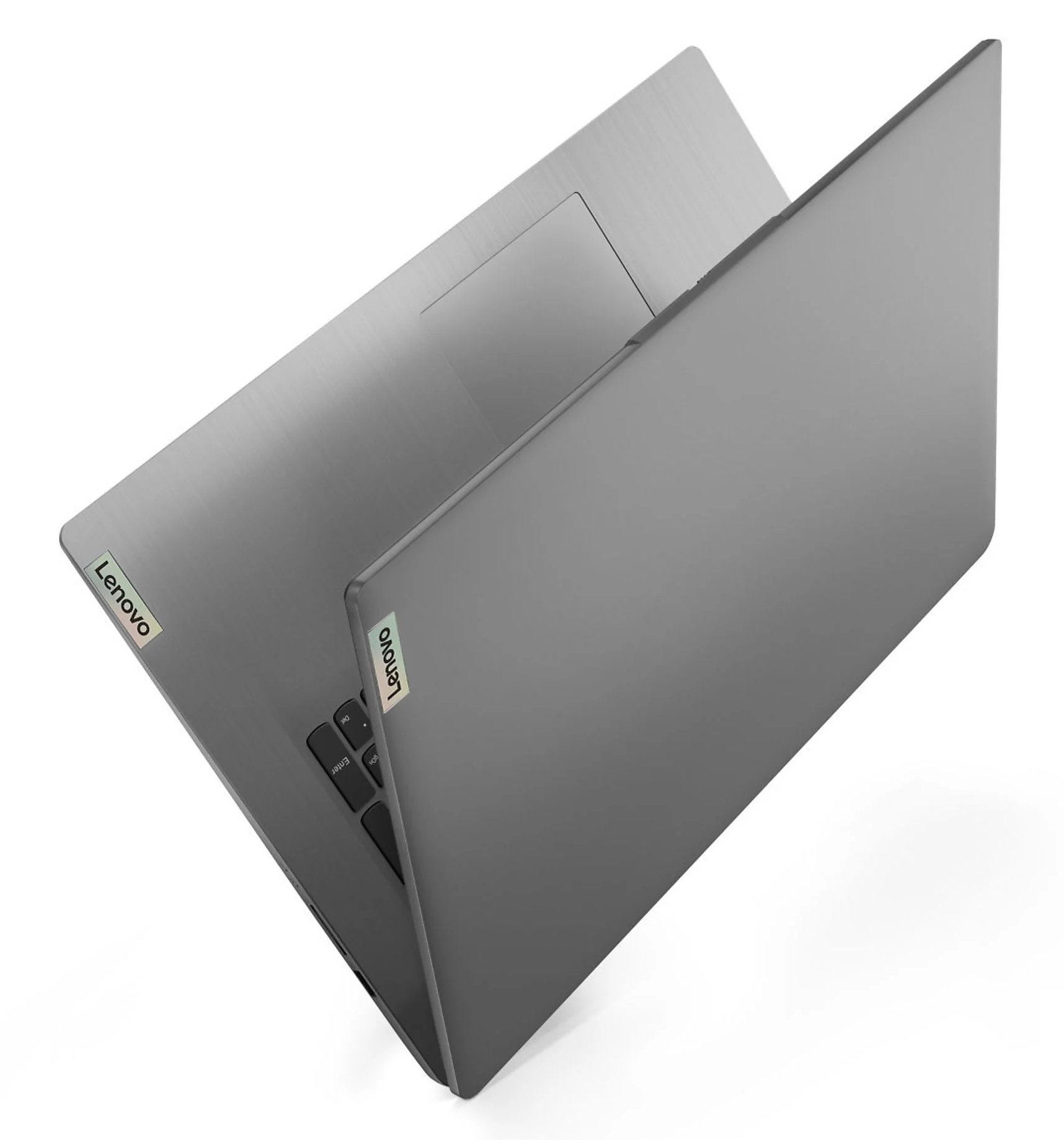 Dwa szare laptopy Lenovo, lekko otwarte, widok pod kątem. Białe tło.