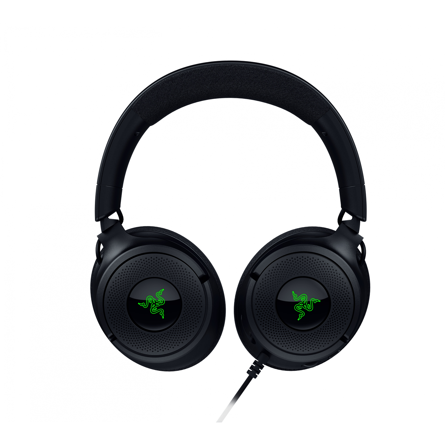 Black gaming headphones with a microphone on a dark green surface, near a black box.