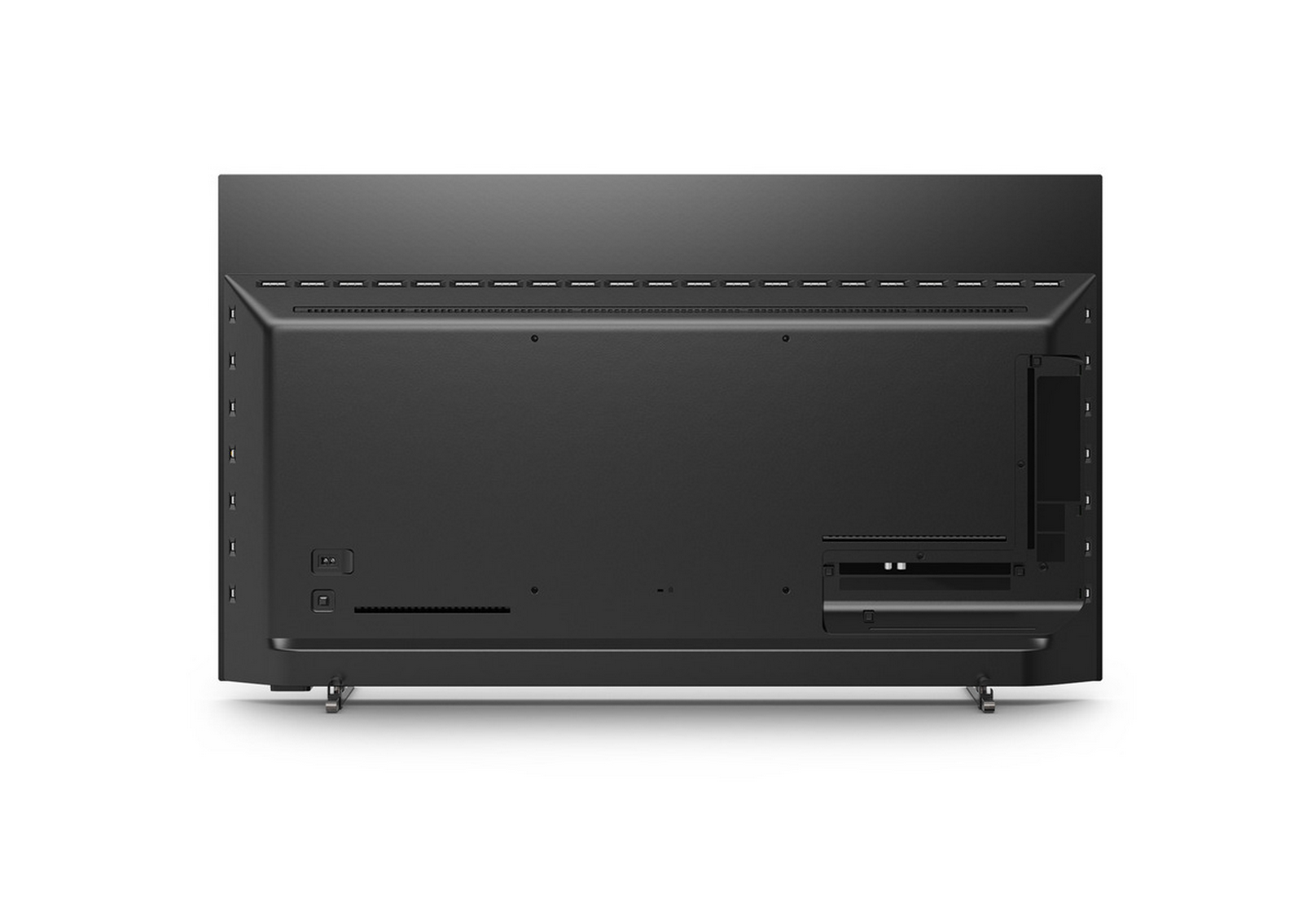 Parte trasera de televisor negro con puertos. Soporte plateado. Fondo blanco.