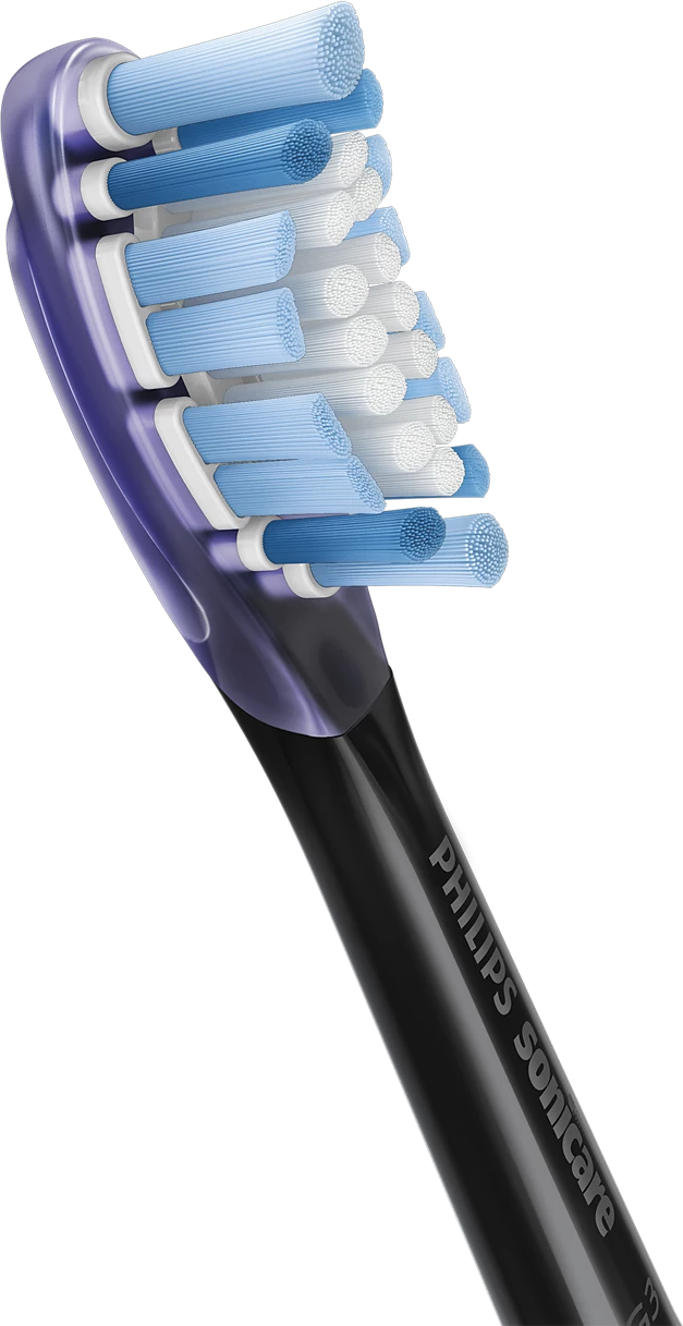 Un primo piano della testina dello spazzolino Philips Sonicare su sfondo nero.