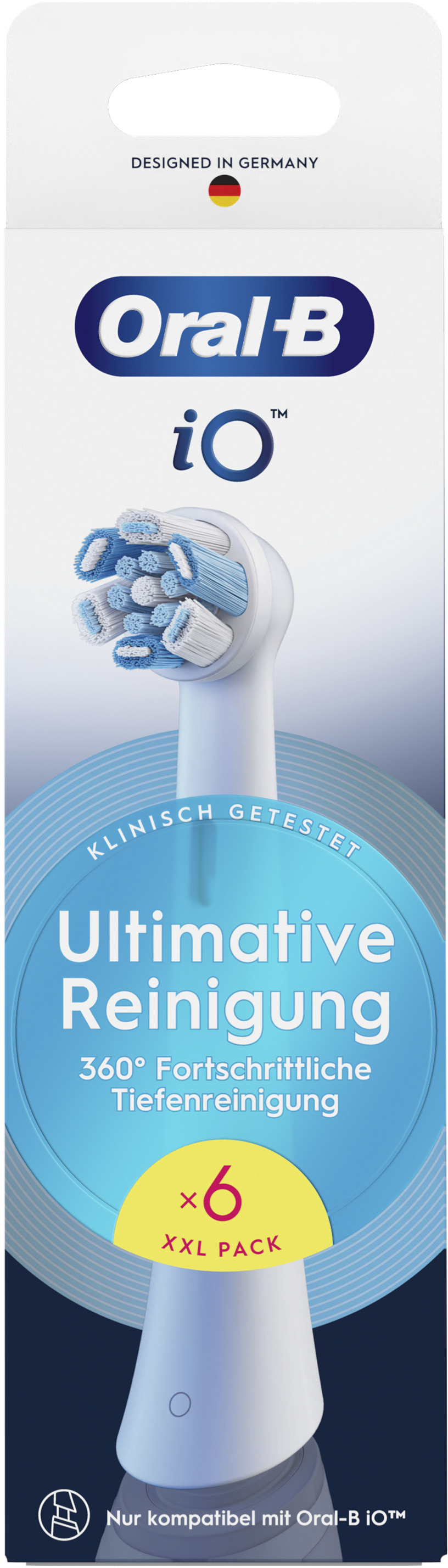 Zahnbürstenkopfbox, weiß und blau, mit einem Zahnbürstenkopf. Text: Ultimate Reinigung.