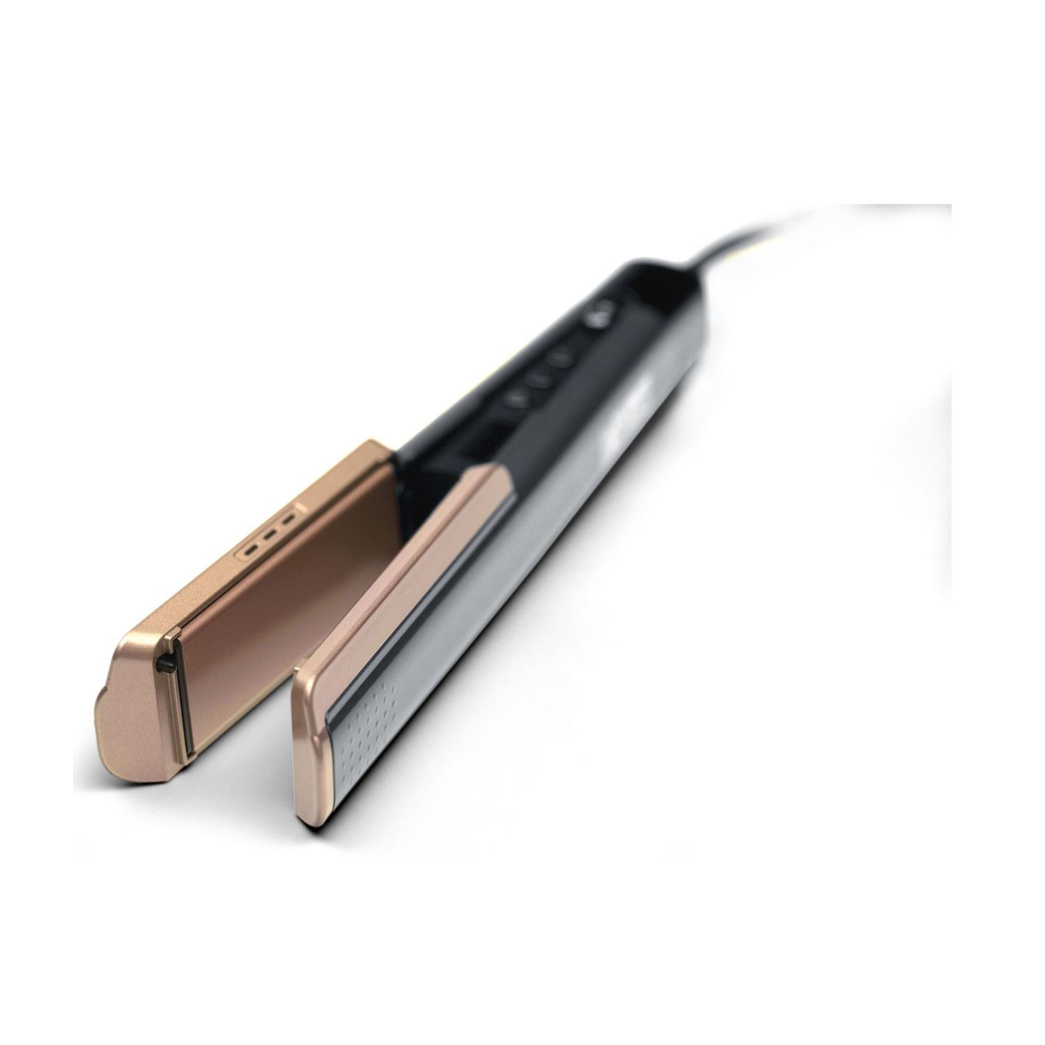 Una piastra per capelli nera e oro appoggiata su una superficie bianca.