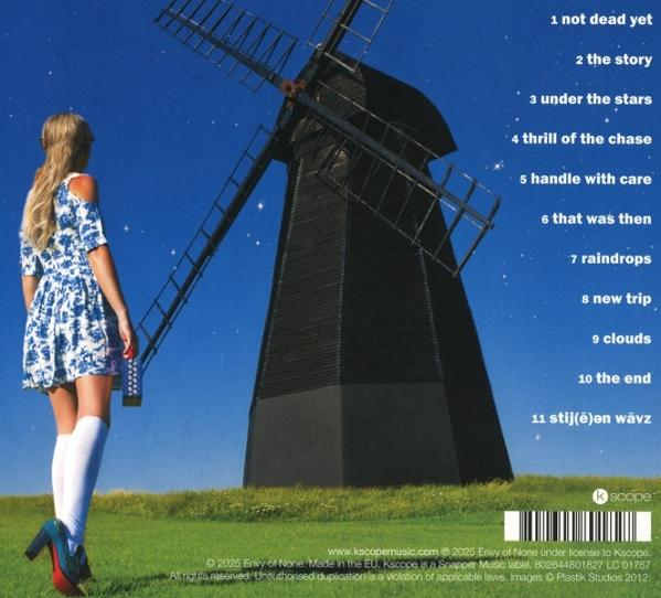 Albumrückseite mit Windmühle und Frau, Songtitel in einer Liste.