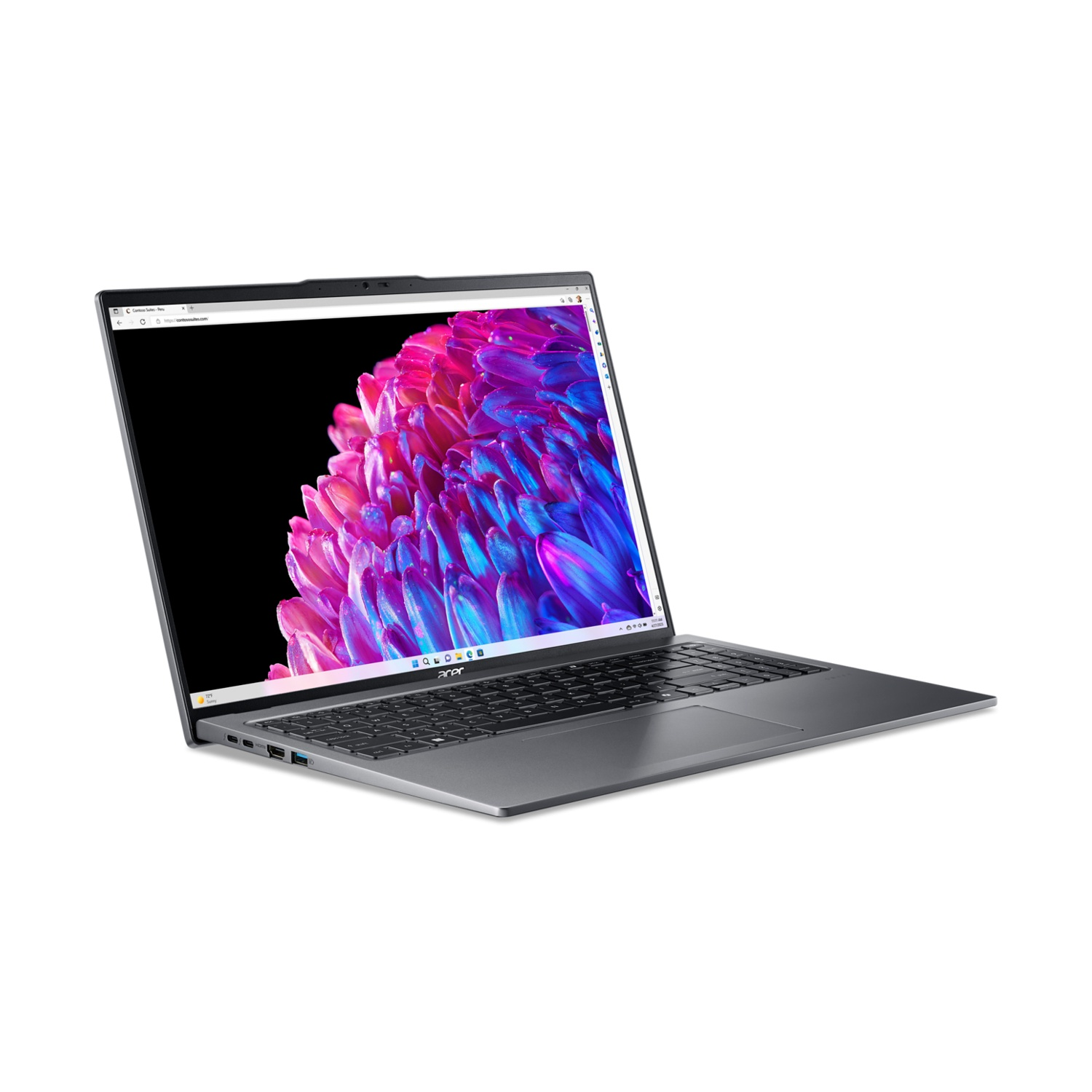 Laptop argentato, aperto, schermo mostra immagine floreale colorata. Sfondo bianco.