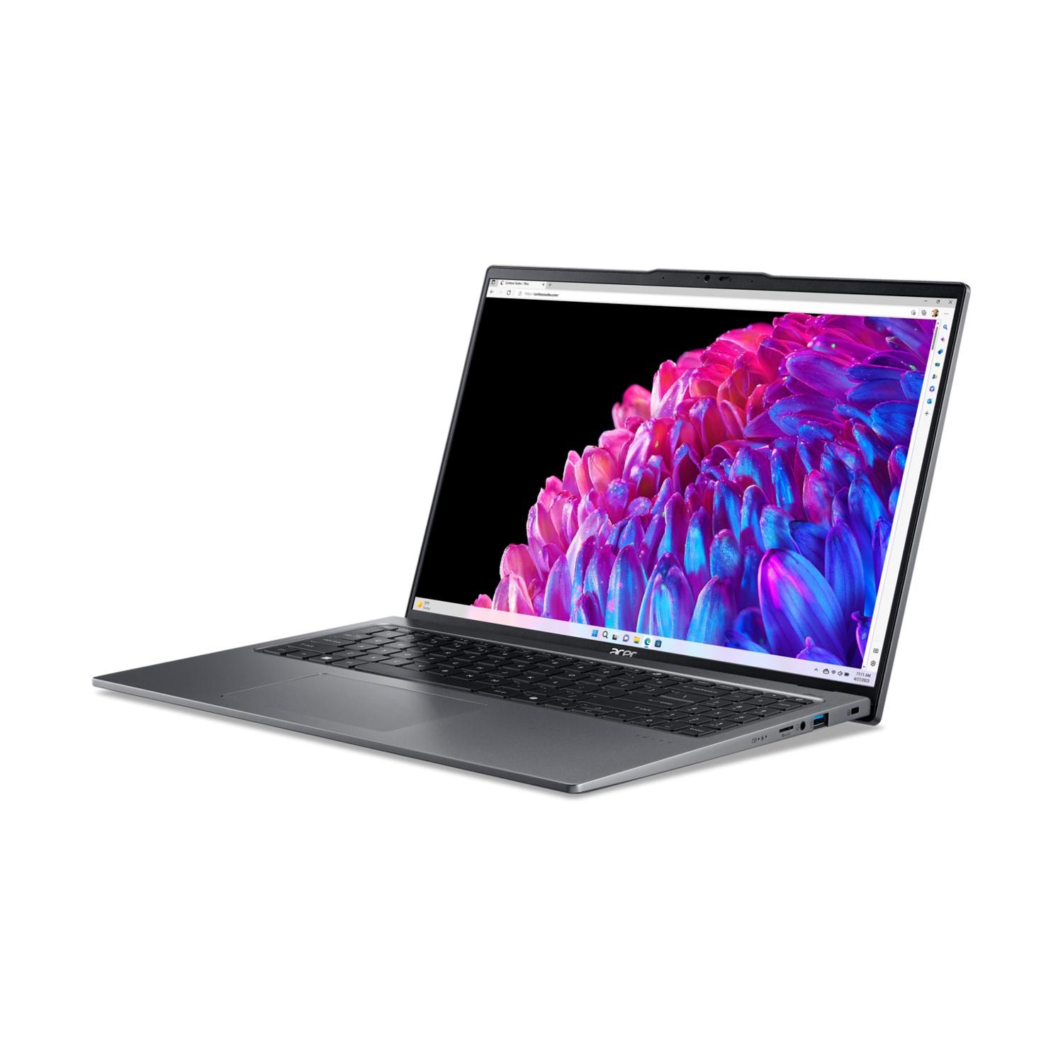 Laptop con schermo nero e display colorato. Aperto su una superficie bianca.