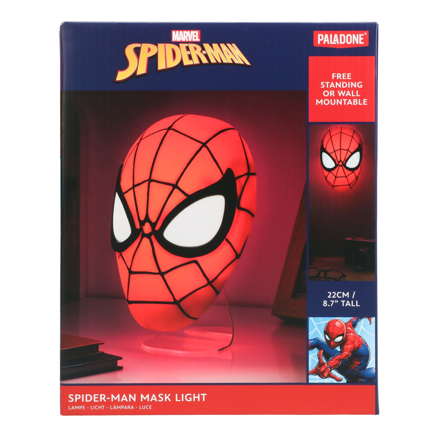 Een Spider-Man maskerlicht in een doos. Het masker is rood en zwart, met een wit oogontwerp.