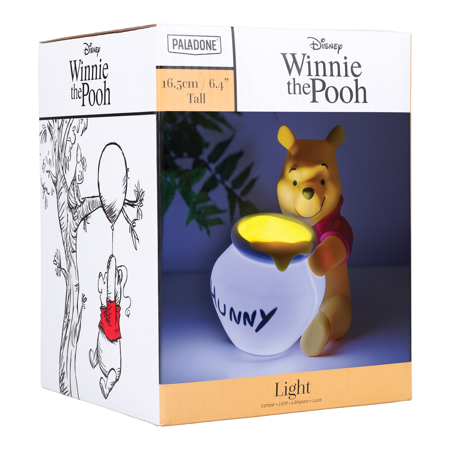 Lampe Winnie l'ourson dans une boîte, avec Winnie et Porcinet sur le côté.