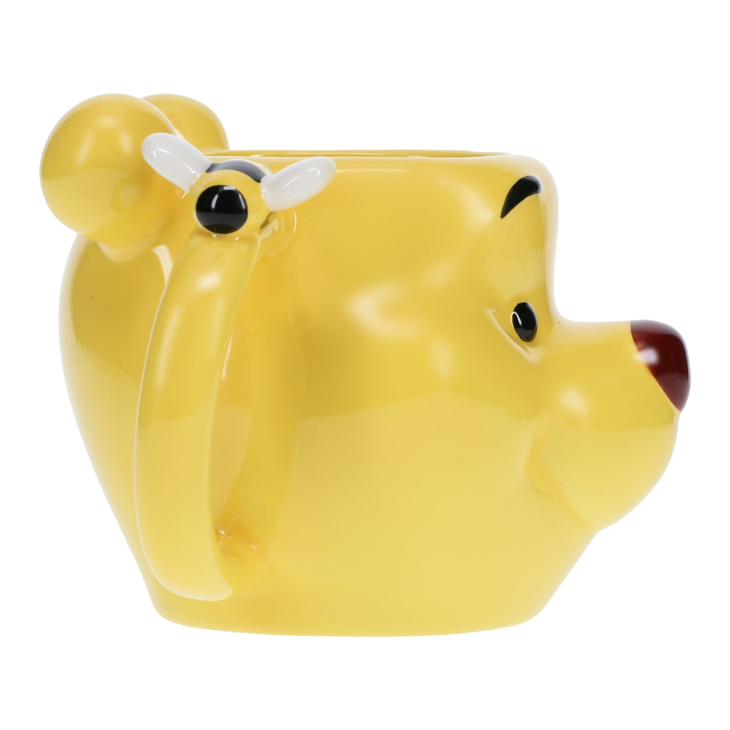 Yellow Winnie the Pooh mug with a bee on the handle. White background.