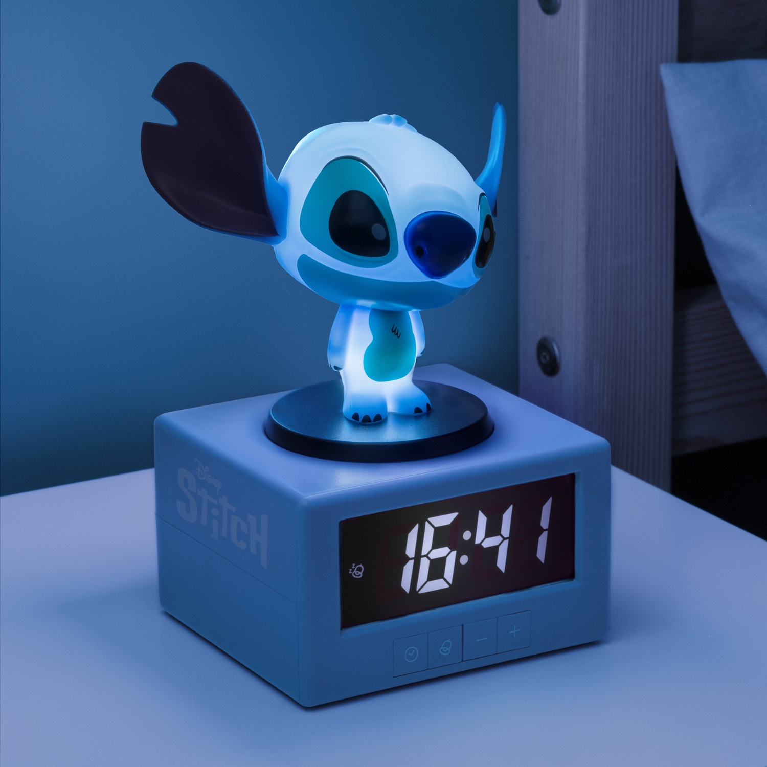 Stitch alarm clock with Stitch figure on top, displaying 16:41.