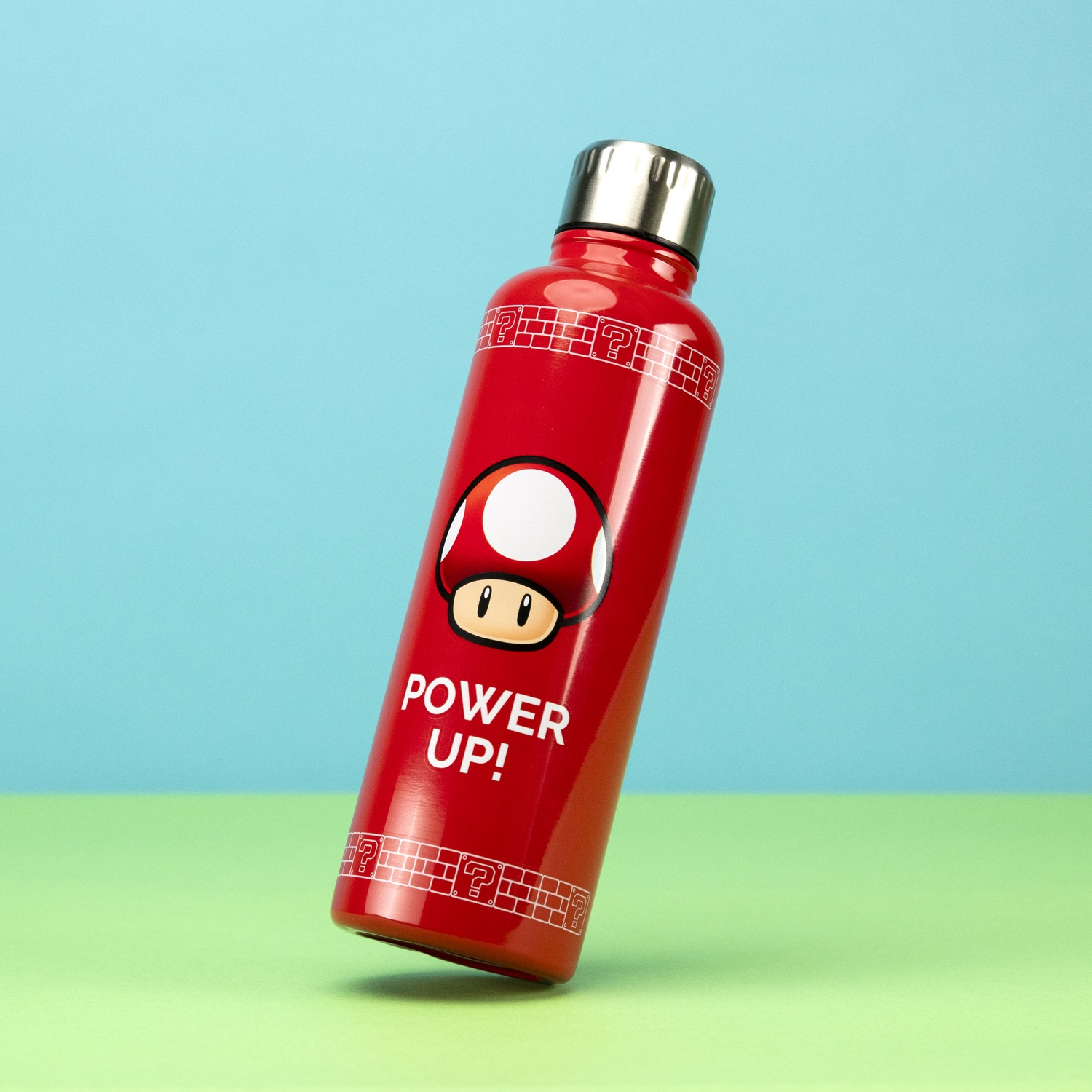 Red water bottle with a Mario mushroom graphic and 'POWER UP!' text.