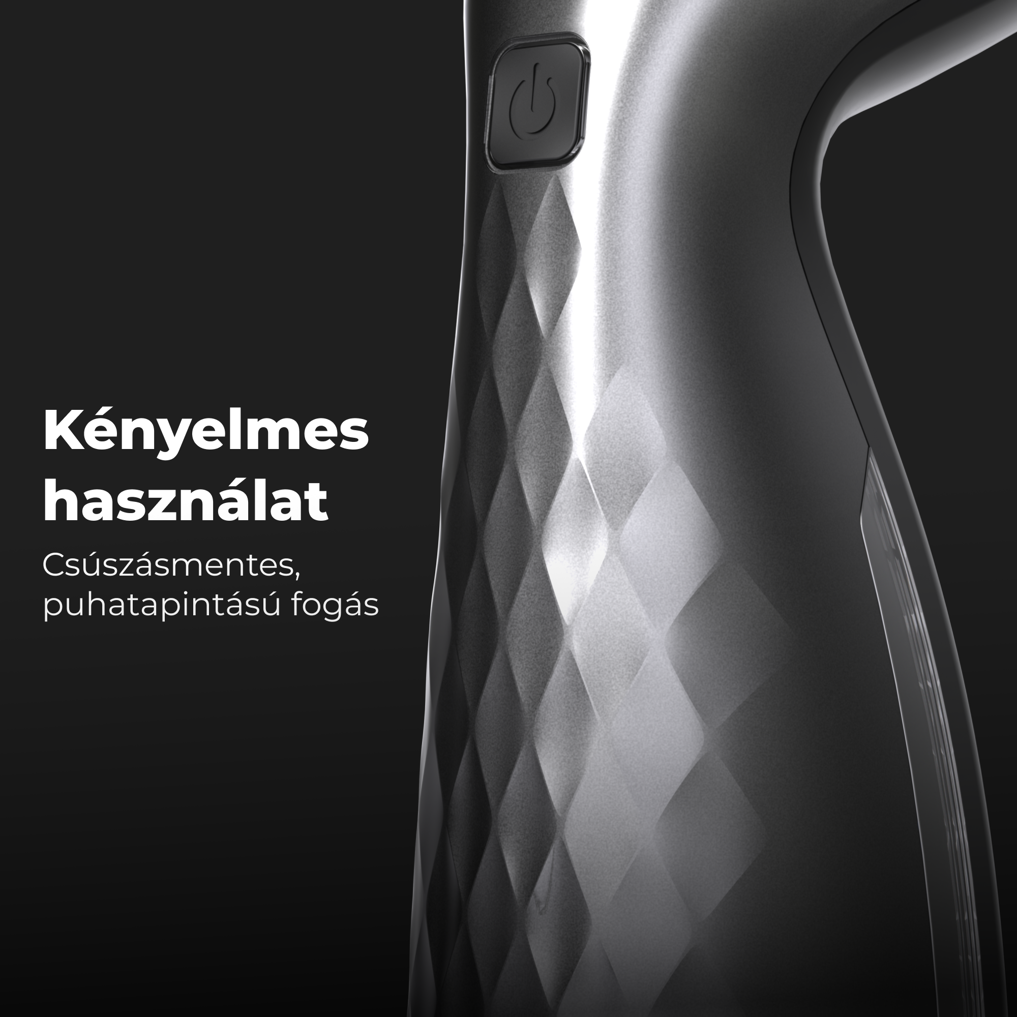 Szürke-fekete eszköz közeli képe bekapcsológombbal, textúrázott felülettel.