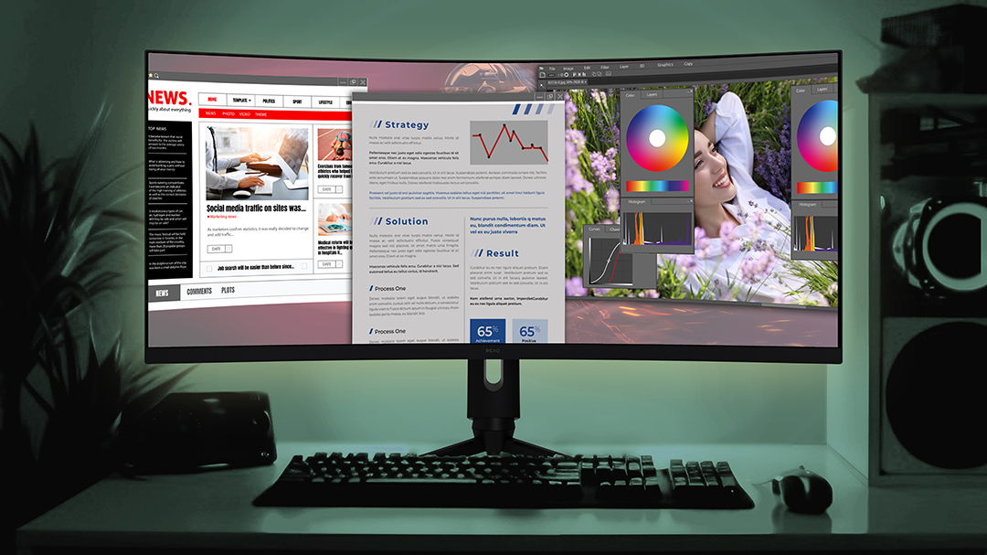 Ívelt monitor weboldalakat és grafikai tervező felületeket jelenít meg, billentyűzettel.