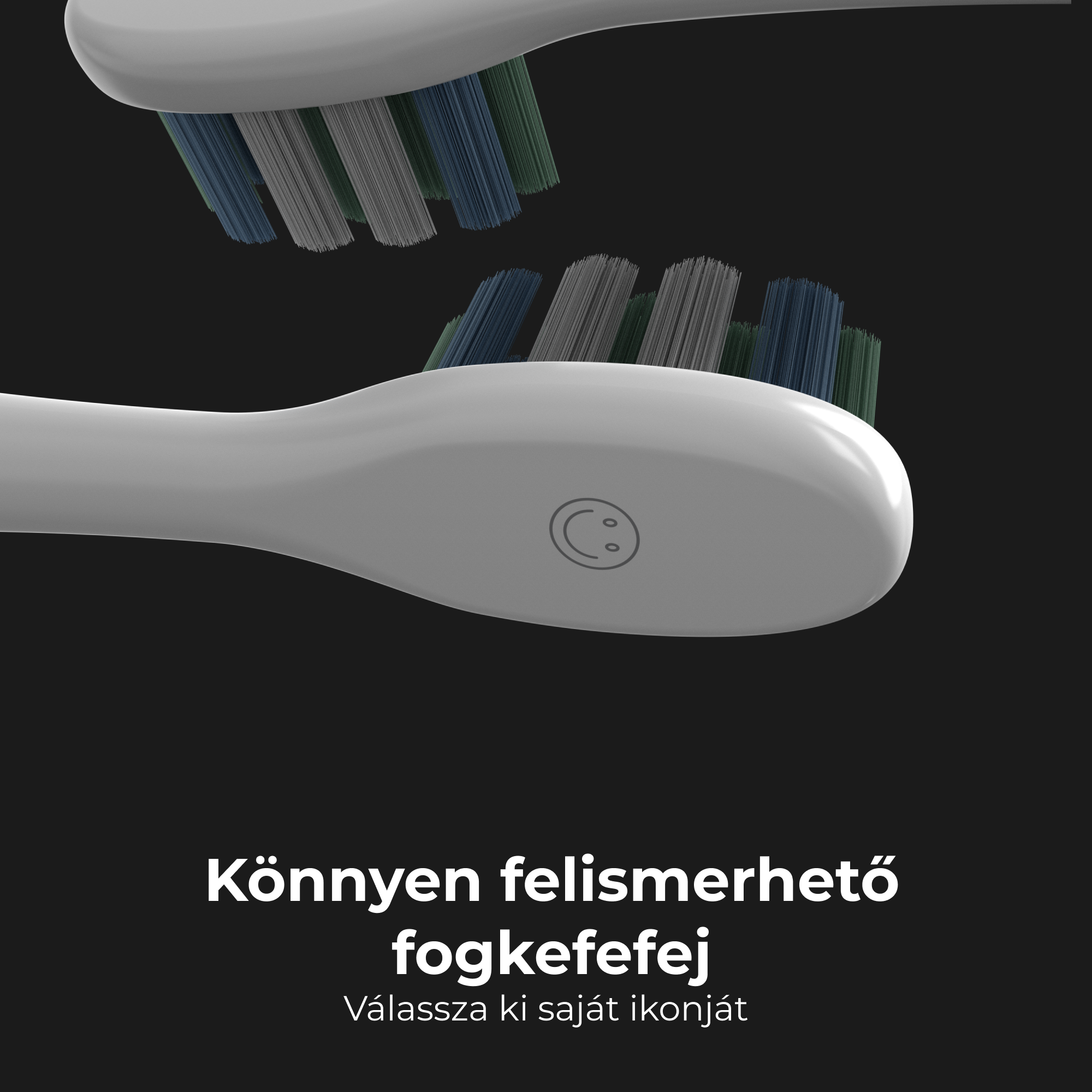 Két fehér fogkefefej közeli képe zöld, kék és szürke sörtékkel.