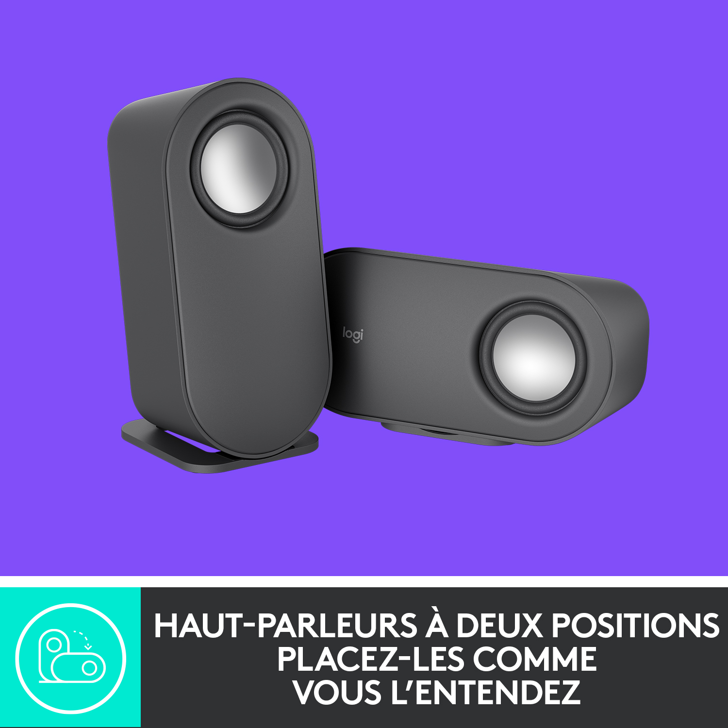 Deux enceintes gris foncé sur un fond violet. L'une est inclinée vers l'autre.
