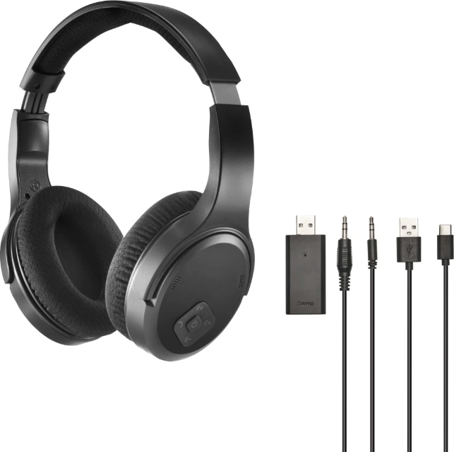 Casque noir, un émetteur et plusieurs cordons sur fond blanc.