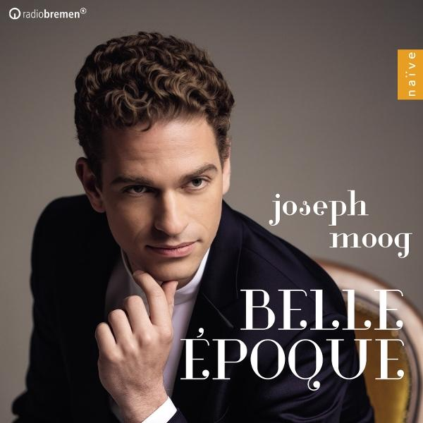 Ein Mann im Anzug hält sein Kinn, Albumcover mit Text 'Belle Époque'.